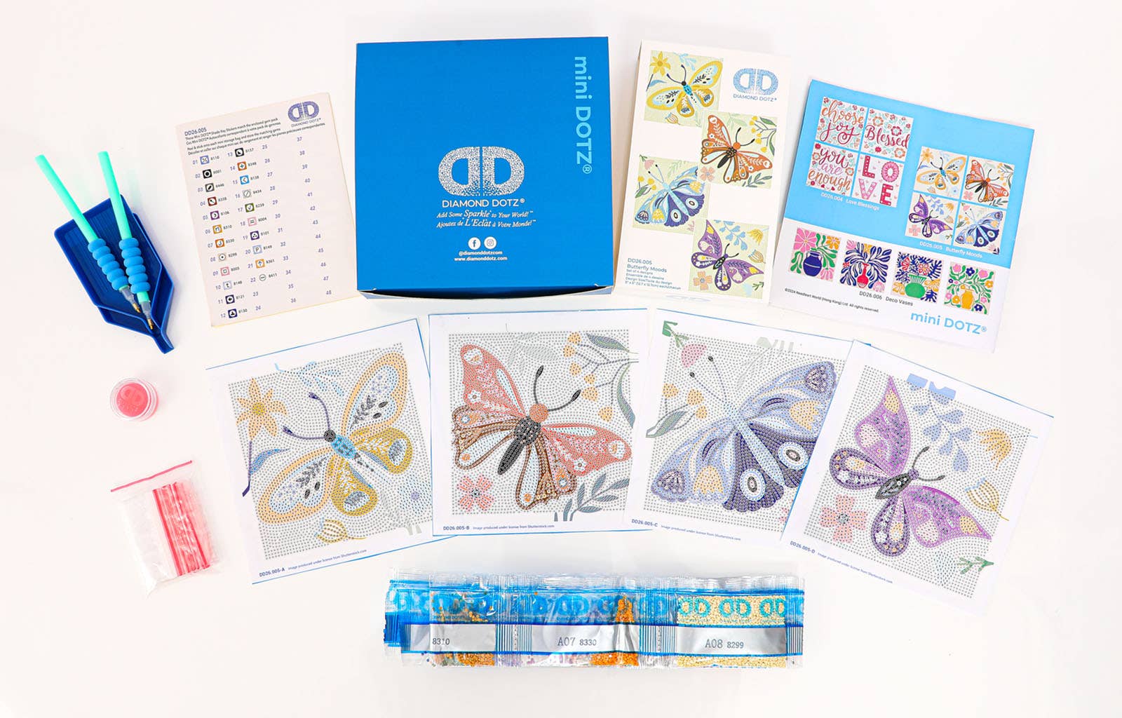 Collection of mini dotz diamond painting kits with colorful designs on a white background