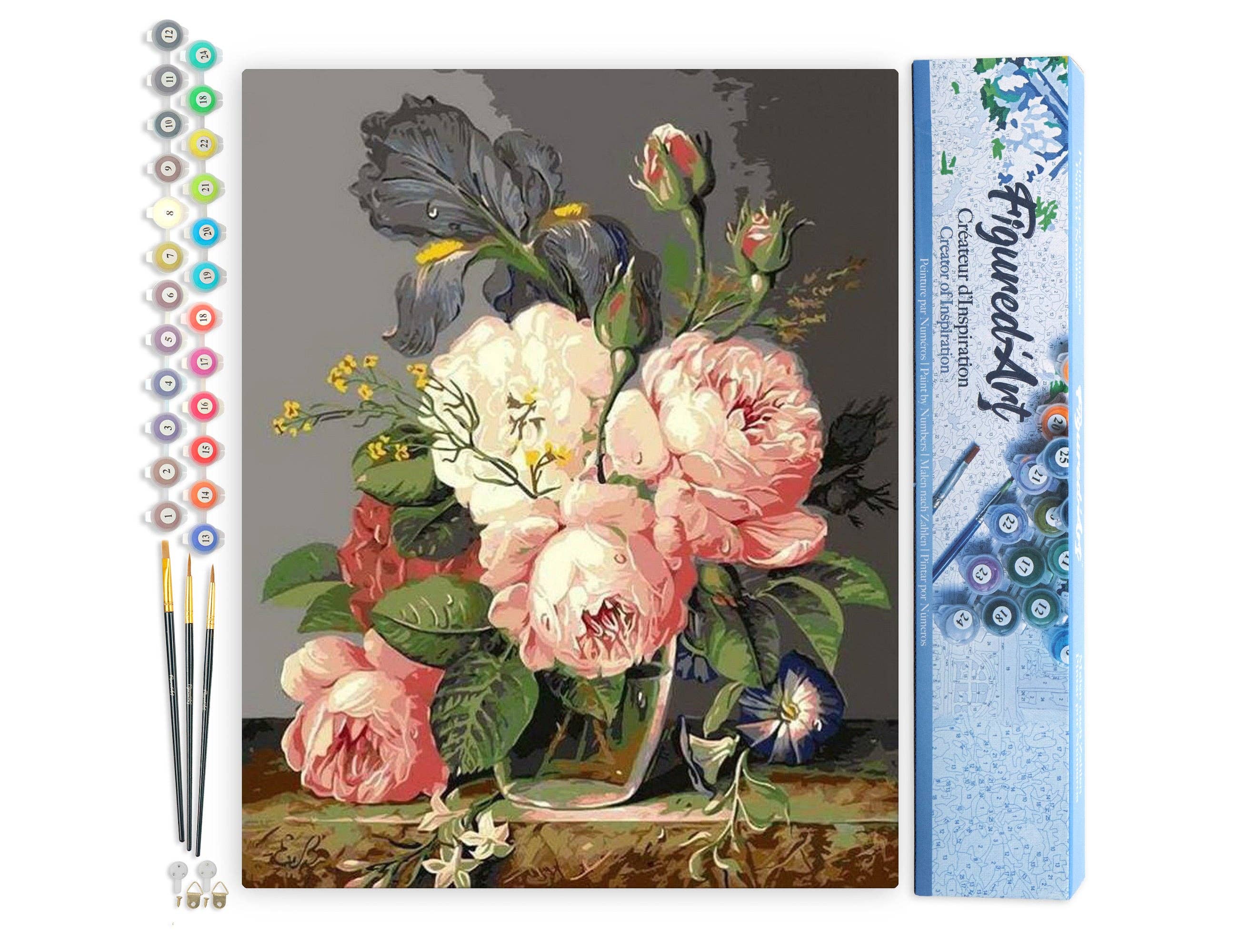 Floral painting with a set of paintbrushes and a paintbox on a white background