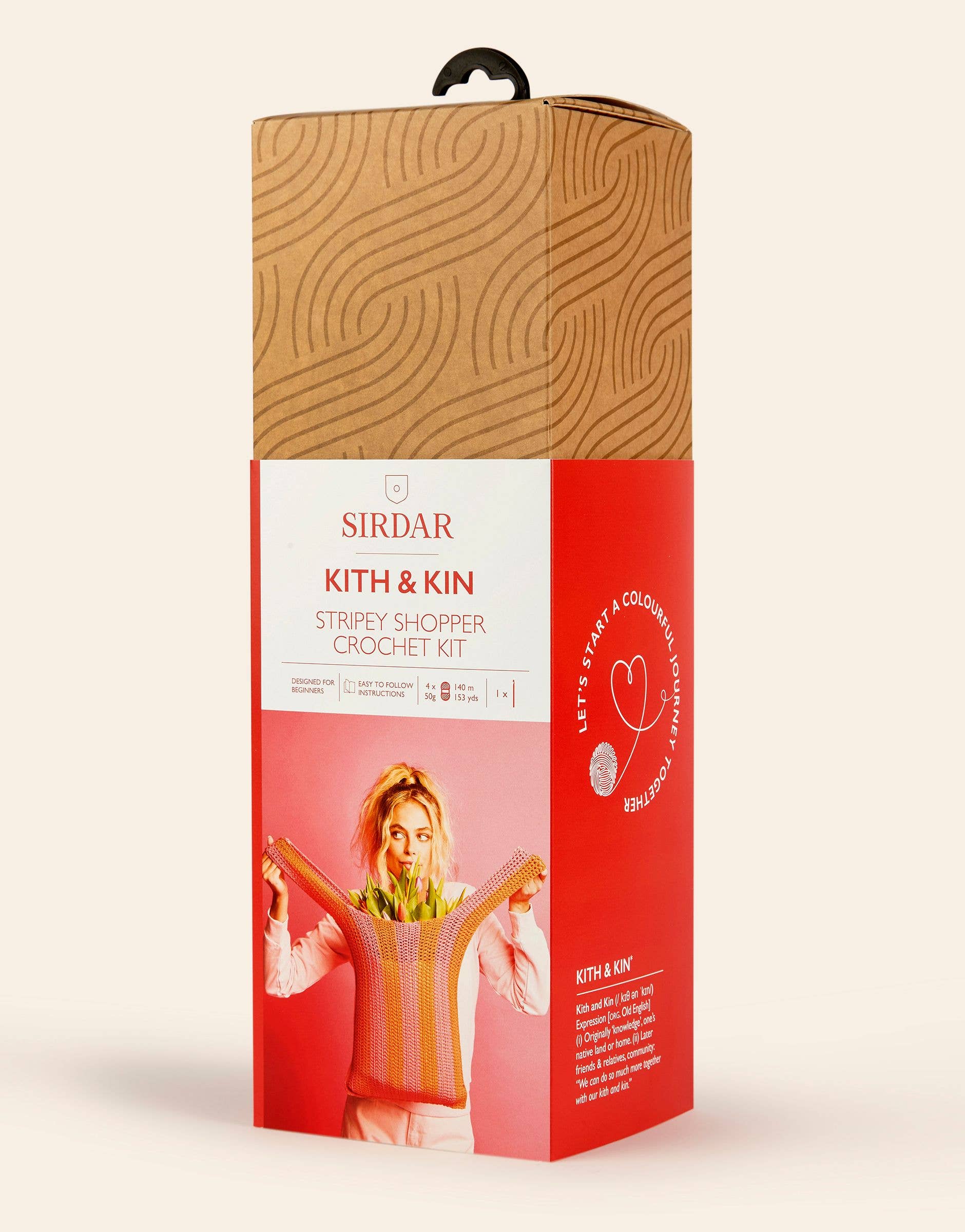 Sirdar Kith & Kin striped shopper crochet kit packaging on a beige background