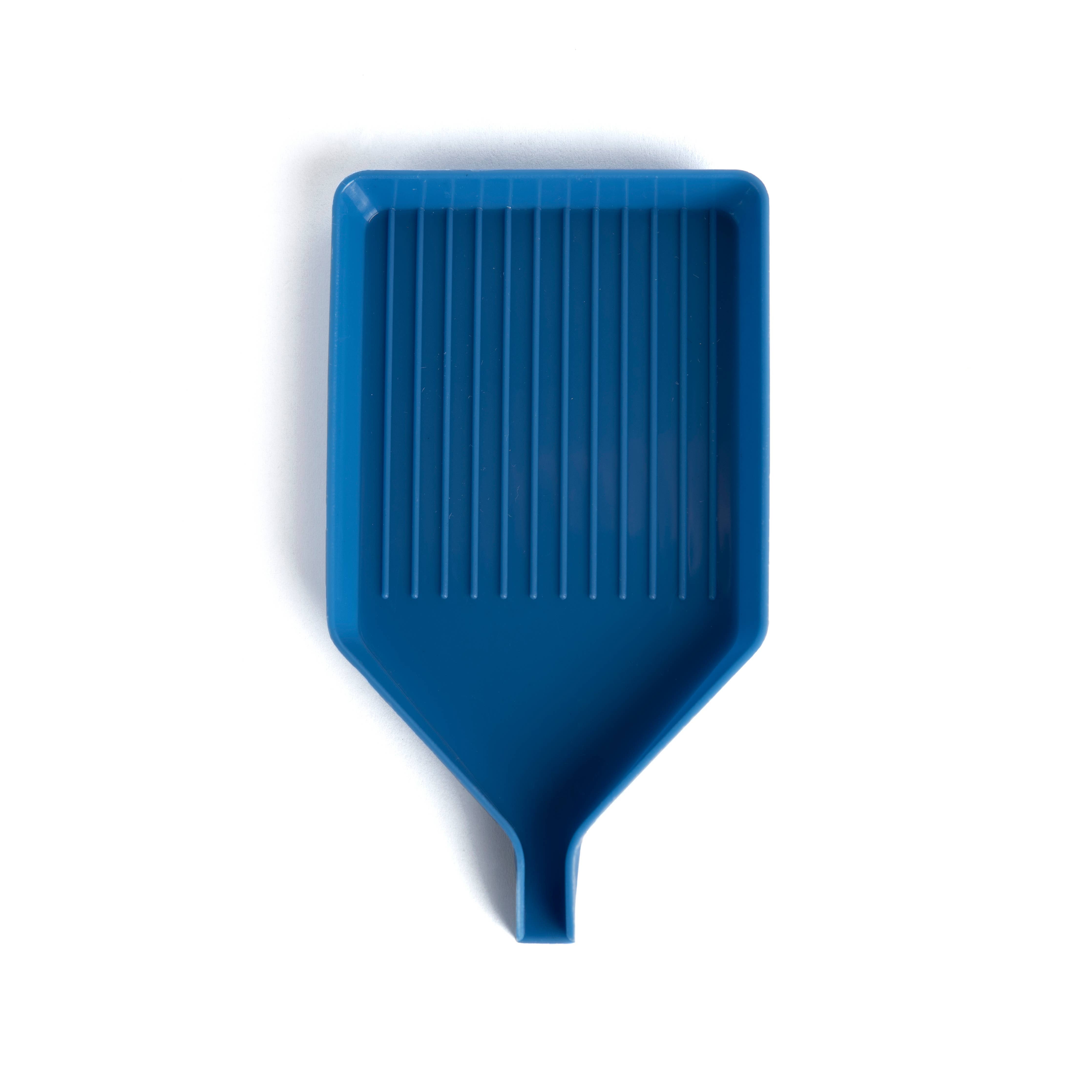 Blue plastic spatula on a white background