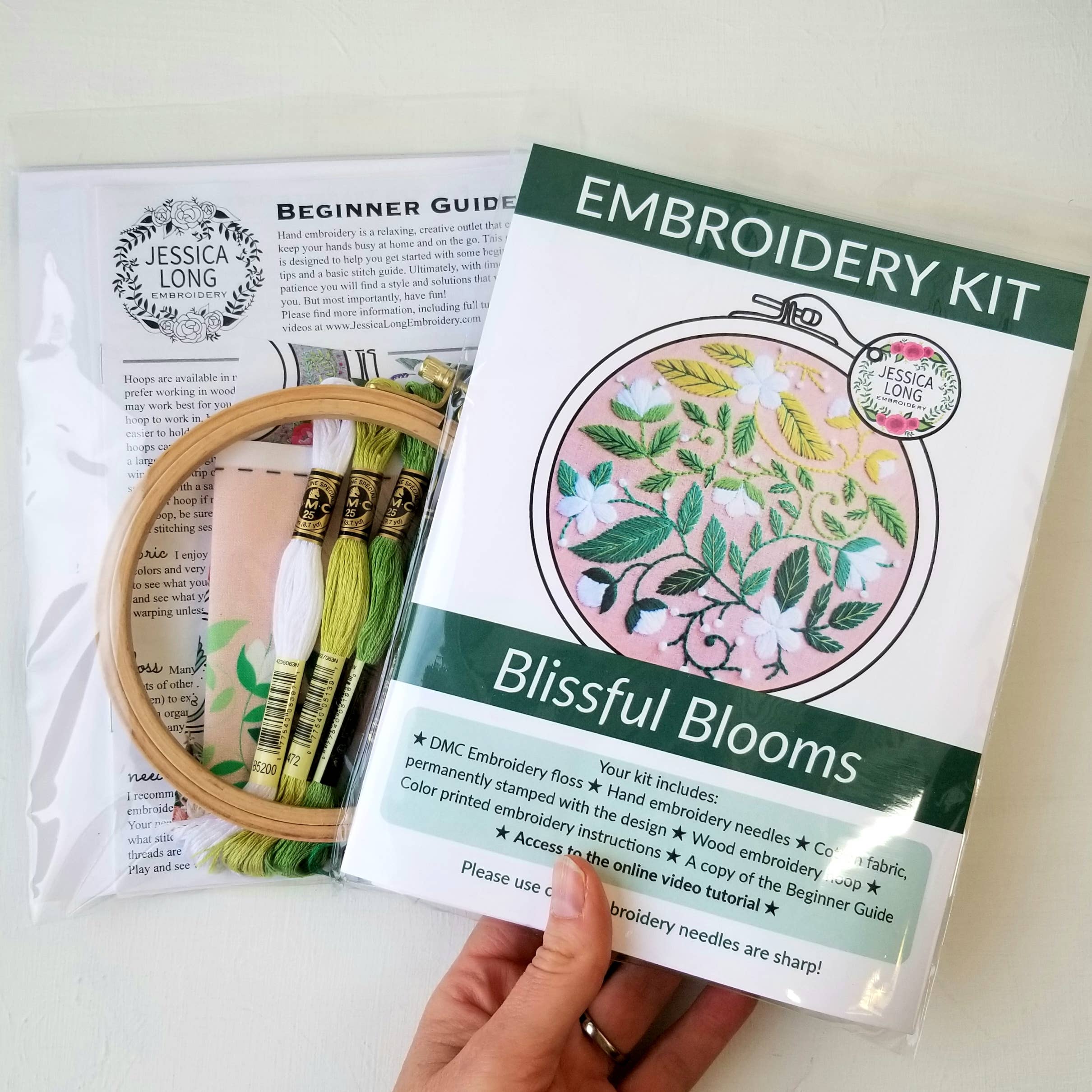 Embroidery kit with 'Blissful Blooms' design on a white background