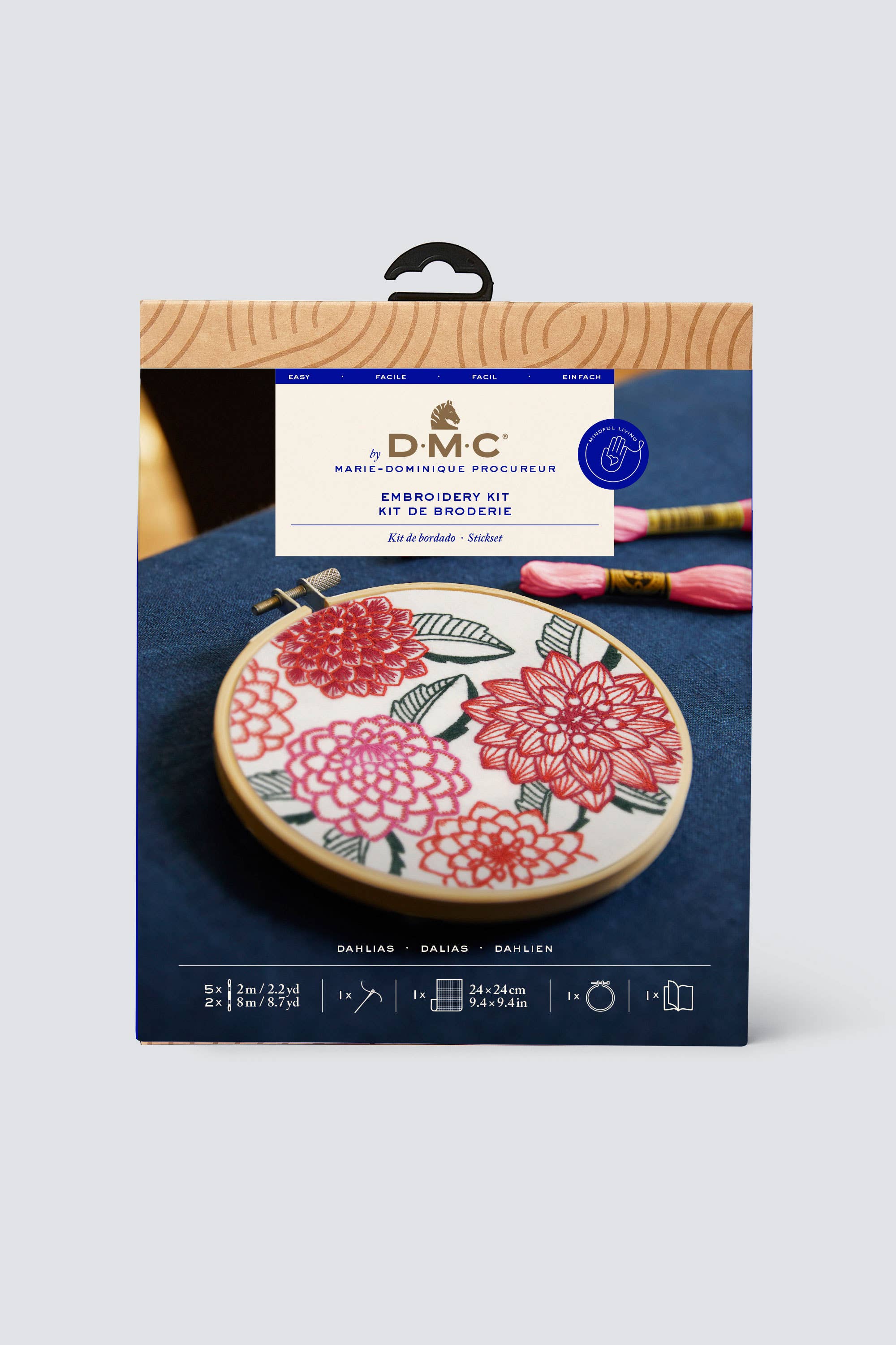 DMC embroidery kit packaging with floral design on a blue background