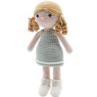 Crocheted doll with blonde hair and a green dress on a white background