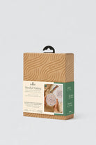 Packaged product with wooden design on a white background