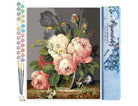 Floral painting with a set of paintbrushes and a paintbox on a white background