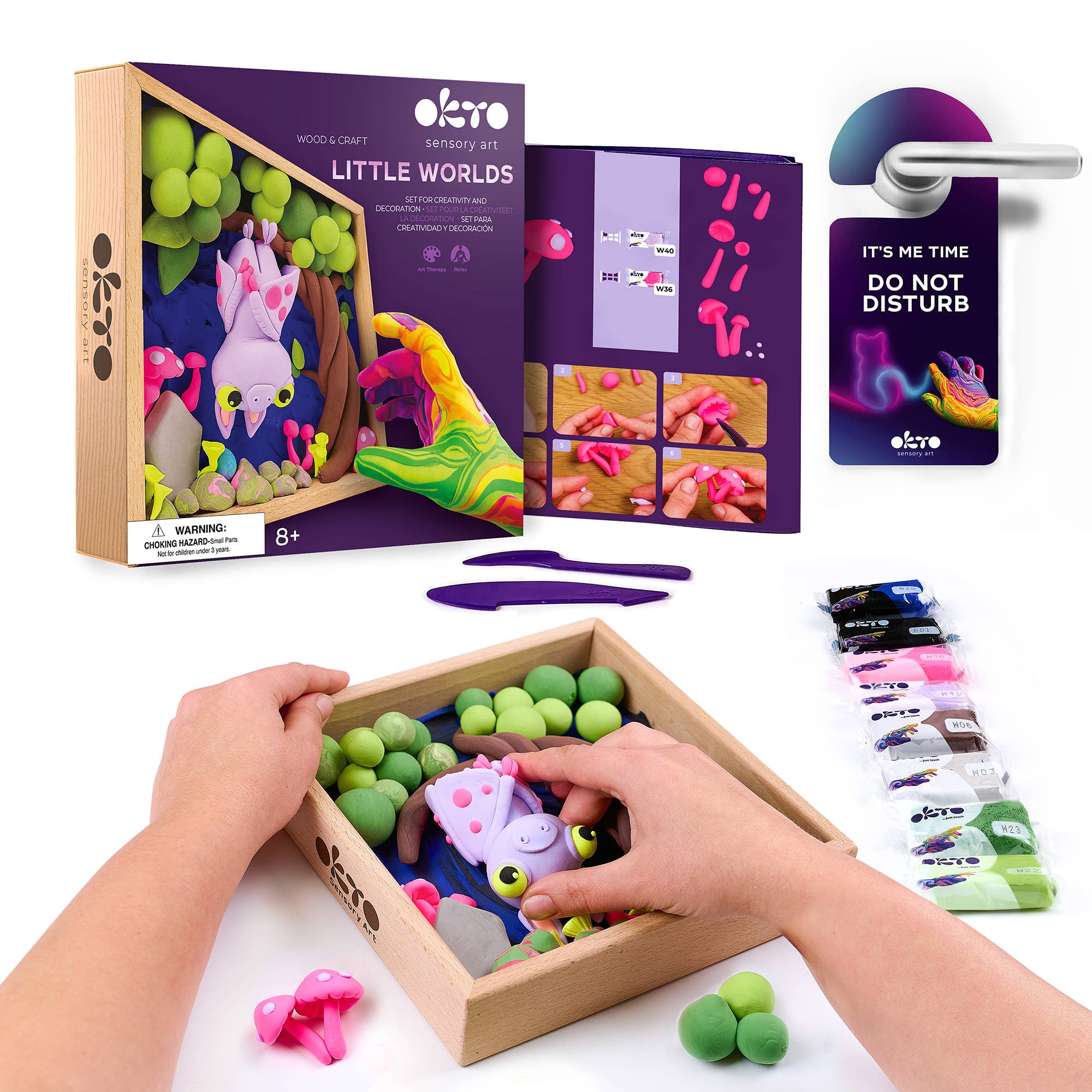 Wooden sensory toy set with colorful animals and packaging on a white background