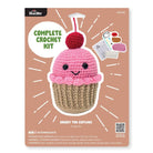 Crochet kit packaging for 'Sherry the Cupcake' with pink ice cream cone on a brown background