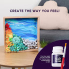 Artistic display with colorful sea-themed decor on a wooden frame, accompanied by acrylic paint and brush.