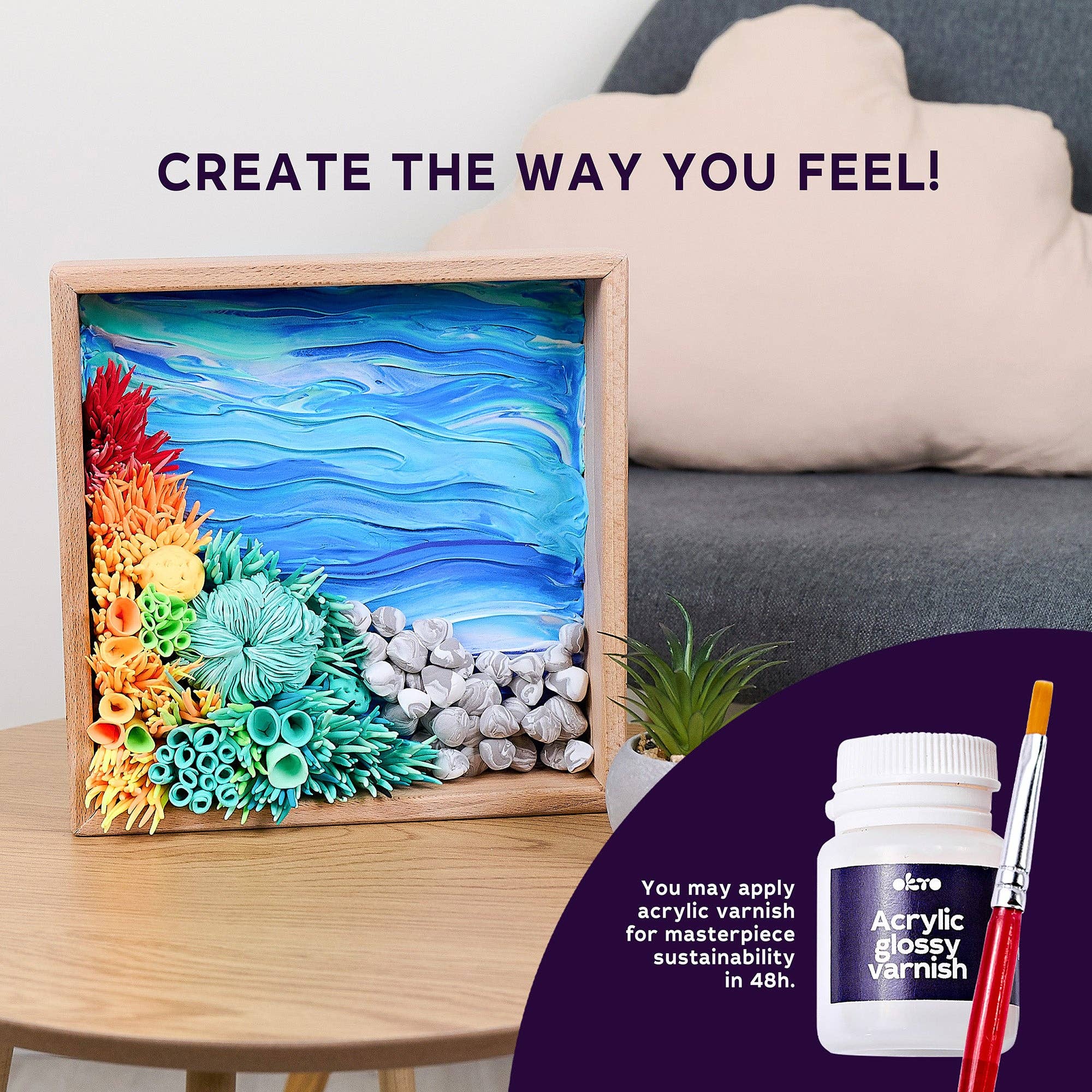 Artistic display with colorful sea-themed decor on a wooden frame, accompanied by acrylic paint and brush.