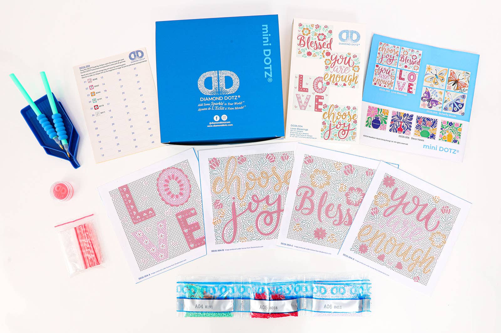 Collection of mini dotz cards with motivational phrases on a white background