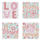 Four cross-stitch patterns with motivational phrases on a white background