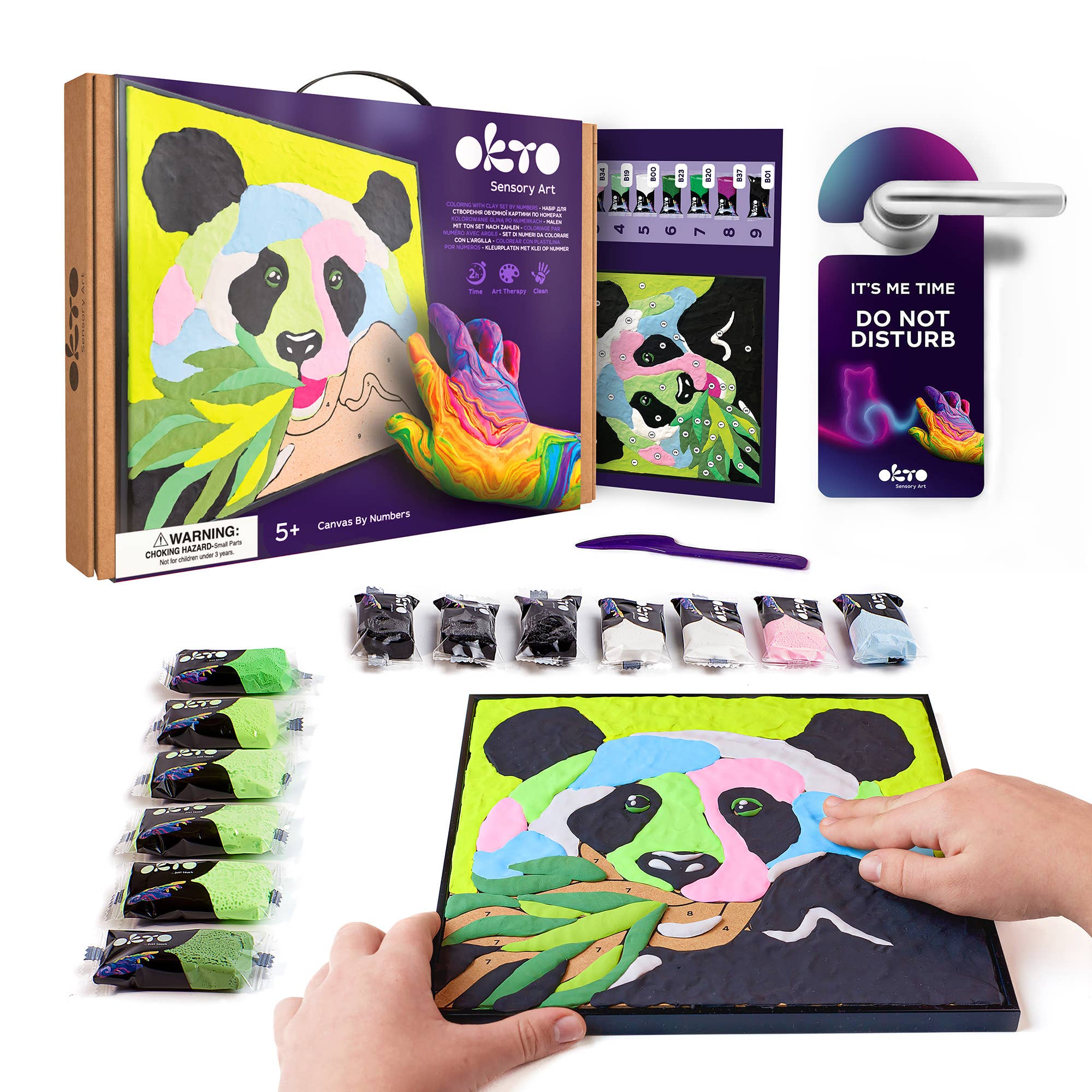 Okto Sensory Art kit with panda design, paint bottles, and a child's hand holding the art set.