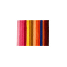 Rectangular mat with colorful striped pattern on a white background