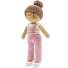 Crocheted doll with pink overalls and brown hair on a white background