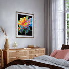 Colorful flower artwork on a wall above a wooden dresser in a bedroom.